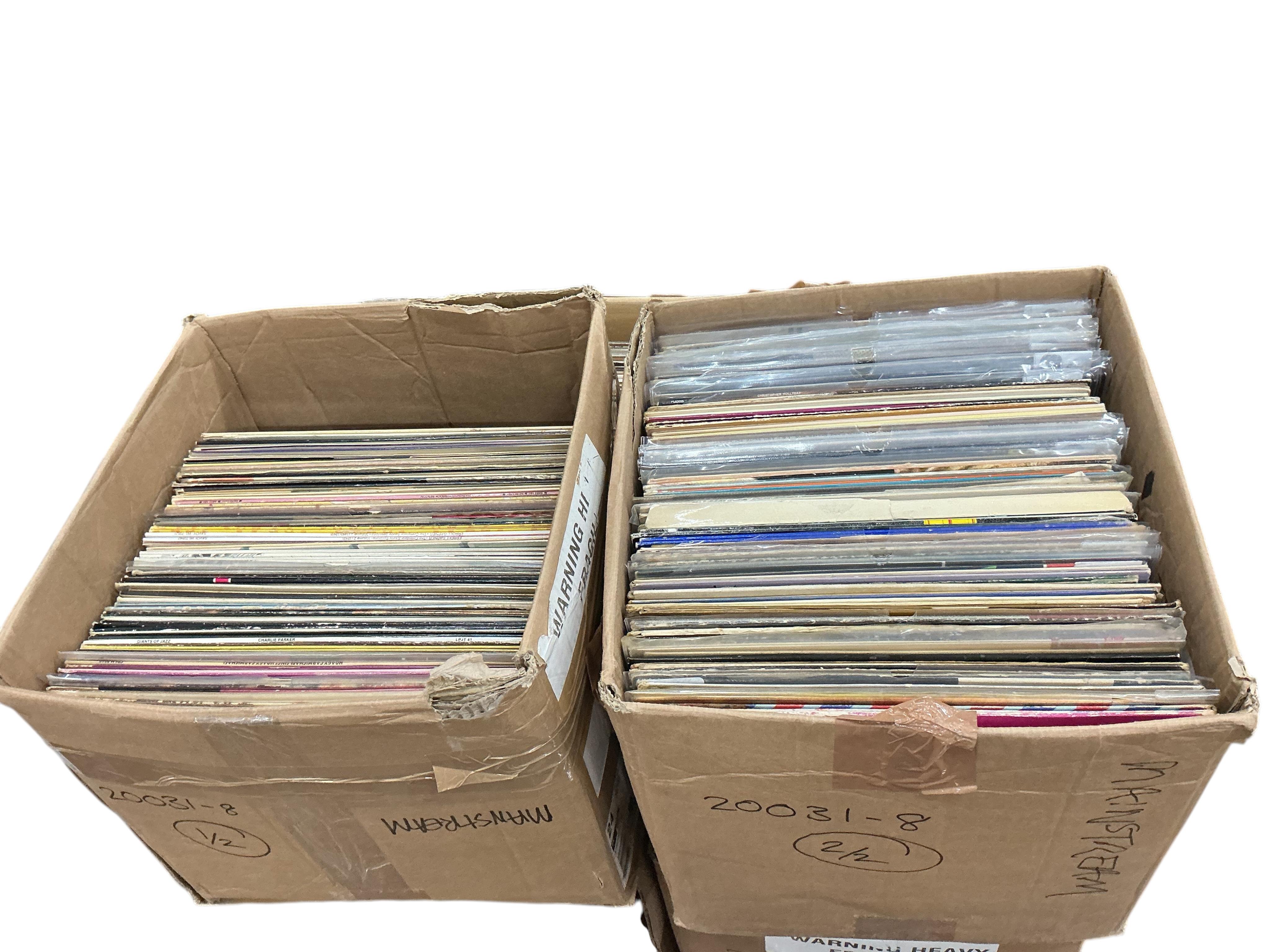 Two boxes of jazz LP record albums, artists including; Maynard Ferguson, Herbie Mann, Charlie Parker, Ben Webster, Earl Hines, duke Ellington, Ray Charles, Modern Jazz Quartet, Ella Fitzgerald, etc.